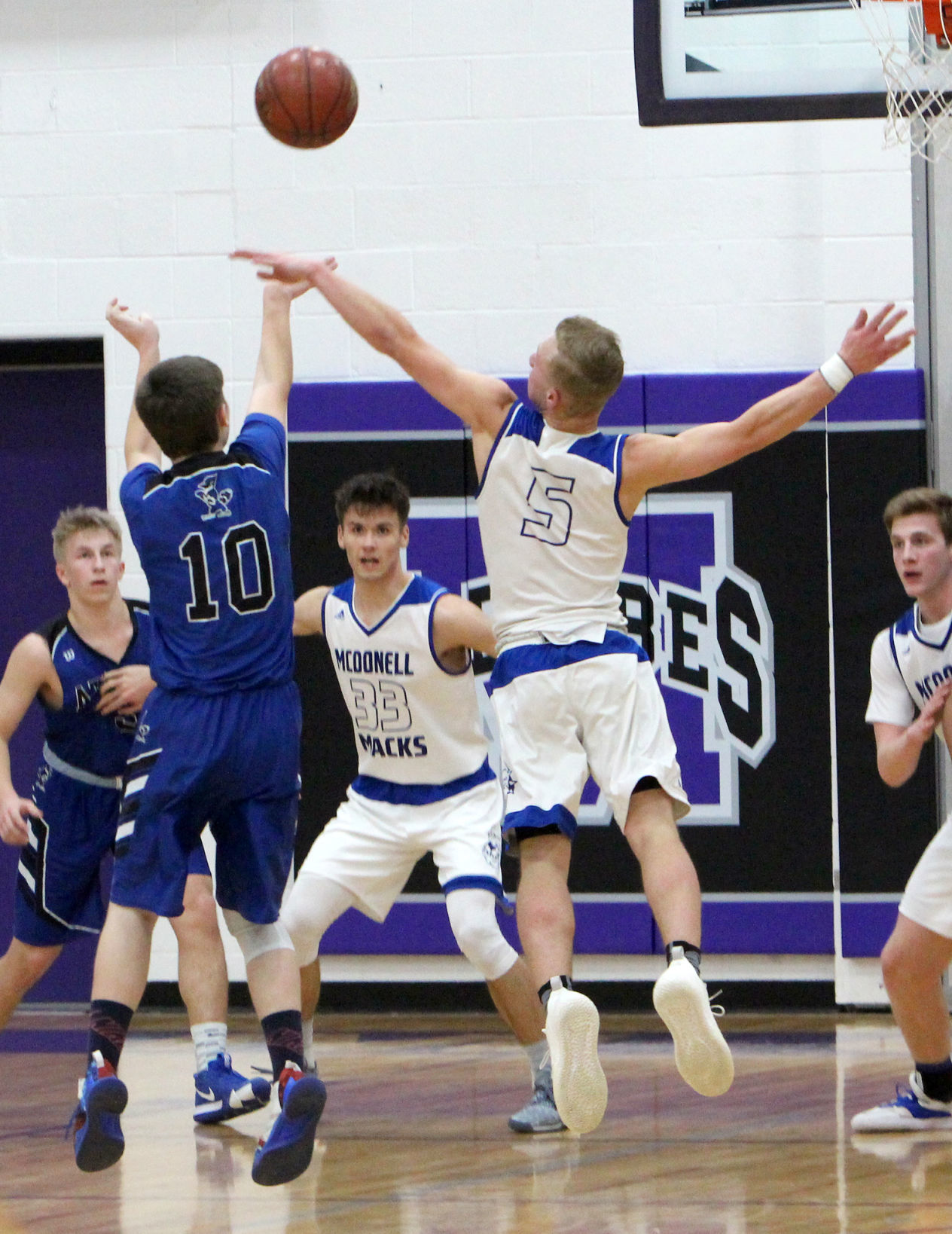 Athens vs McDonell boys basketball at Eau Claire Memorial 3-7-19